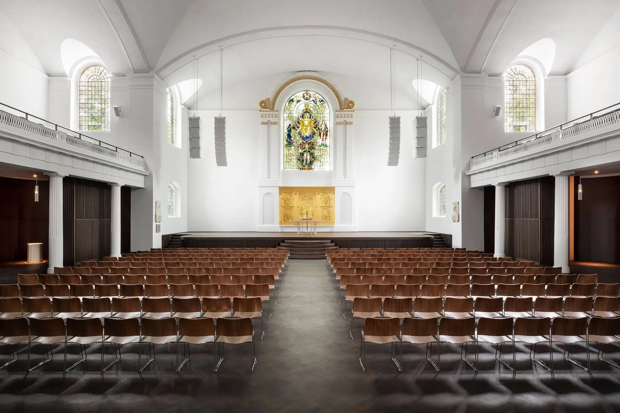 Hackney Church sanctuary cathedral interior with stained glass windows